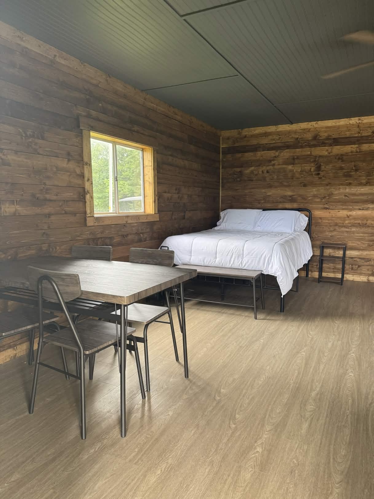 Cabin interior with queen bed