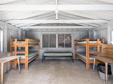 Cabin interior with camp-style bunk beds